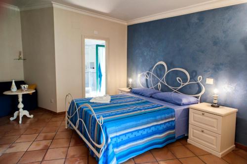 En eller flere senge i et værelse på CETARA - ALBERGO DIFFUSO