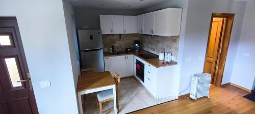 Køkken eller tekøkken på Cabana Mămăruța