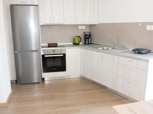 Køkken eller tekøkken på Cozy apartment in Ialyssos