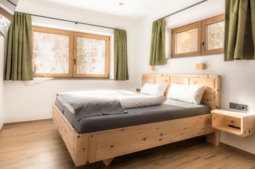 Postel nebo postele na pokoji v ubytování Ferienwohnungen Fiechtl