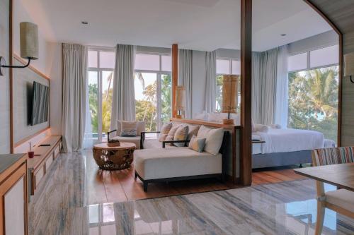 En eller flere senge i et værelse på Sichon Tesoro