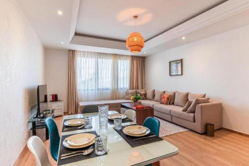 Khu vực ghế ngồi tại Appartement Cosy et central