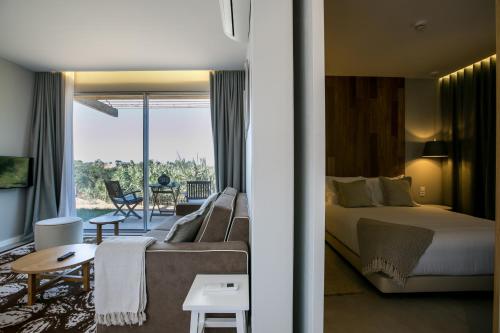 Ένα ή περισσότερα κρεβάτια σε δωμάτιο στο Vale d'Azenha Hotel Rural & Residences