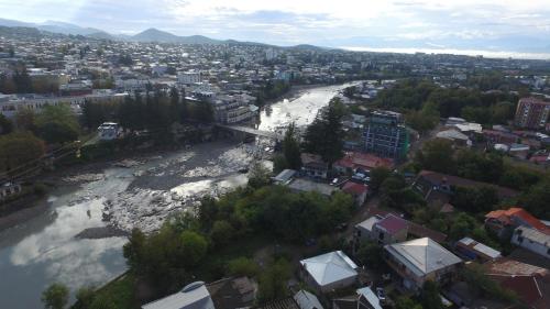 an aerial view of a river in a city at Ponte in Kutaisi