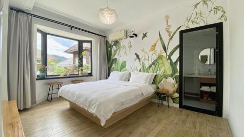 Postel nebo postele na pokoji v ubytování Banlan House