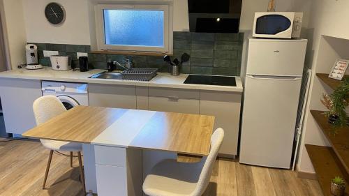 Køkken eller tekøkken på Charmante maison