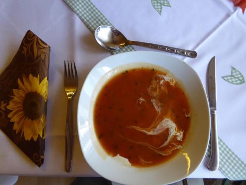 a bowl of soup sitting on top of a table at Landgasthof Schneller in Katzwinkel