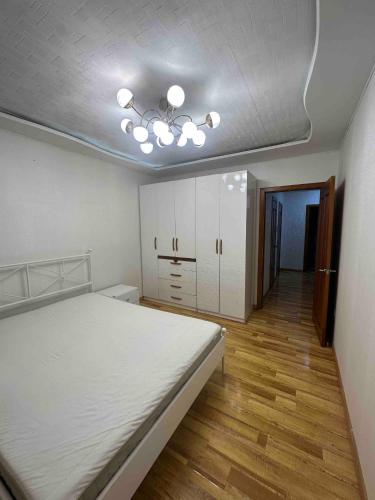 Postel nebo postele na pokoji v ubytování Central Apartment