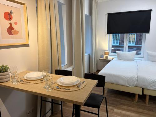 Postel nebo postele na pokoji v ubytování Neues Apartmenthaus mit 4 Wohnungen im Zentrum