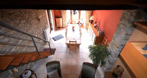 an overhead view of a staircase in a building at La Grange in Rochehaut