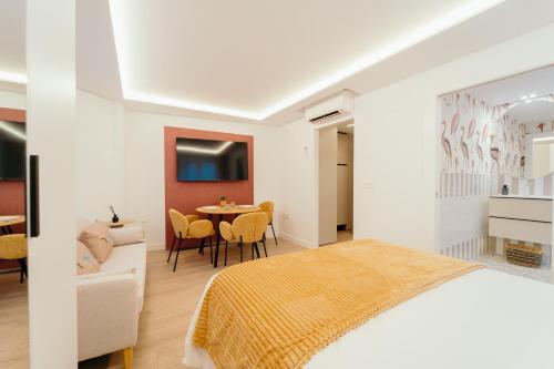 Een bed of bedden in een kamer bij Fuente H1