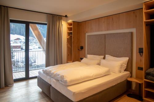 En eller flere senge i et værelse på Aurum