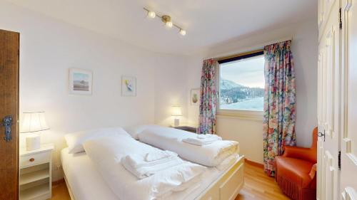 En eller flere senge i et værelse på Polaschin