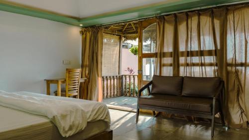 Postel nebo postele na pokoji v ubytování Mariposa Beach Grove