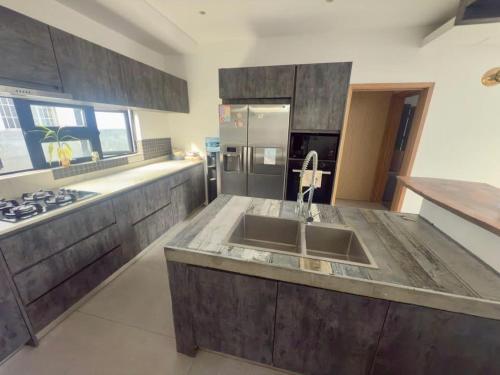 Kuchyň nebo kuchyňský kout v ubytování LS maison de vacance