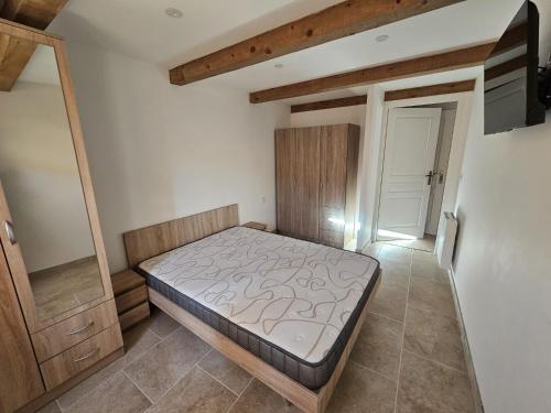 Giường trong phòng chung tại Grand appartement en centre-ville