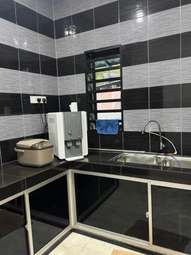 Køkken eller tekøkken på Bungalow Pool Villa