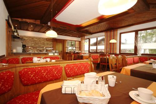 En restaurant eller et andet spisested på Wellness-Pension Jagahütt'n