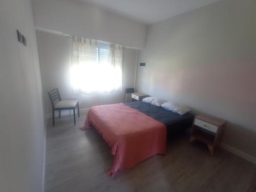 En eller flere senge i et værelse på Mansilla playa