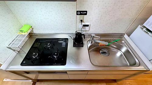 Cucina o angolo cottura di 悠然居SR Inn