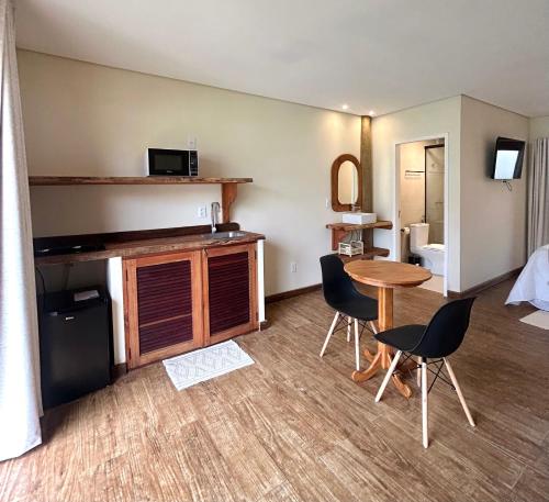 Køkken eller tekøkken på Chalé Doce Vida