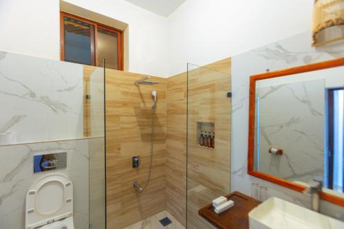 Koupelna v ubytování Sky & Sand Zanzibar