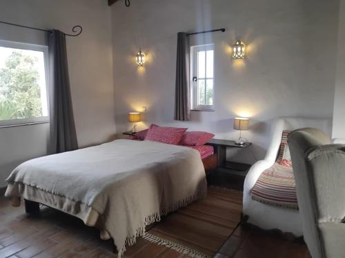 En eller flere senge i et værelse på Quinta do Paraiso