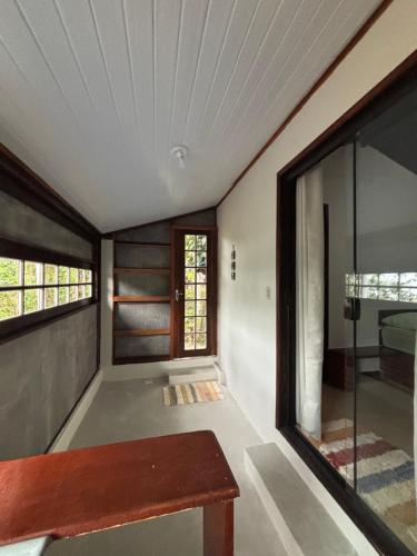 En eller flere senge i et værelse på Suítes Ventos do Mar