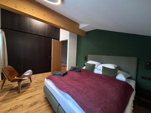 Postel nebo postele na pokoji v ubytování Zug503 Appartement in Lech am Arlberg