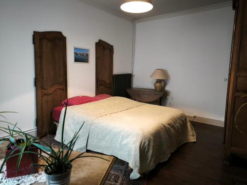 Giường trong phòng chung tại Cocon pyrénéen