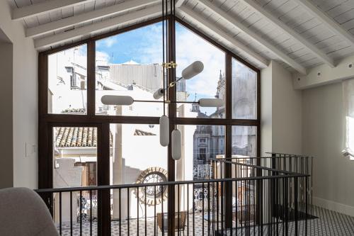 Casa del Reloj Boutique, vistas catedral, parking cercano