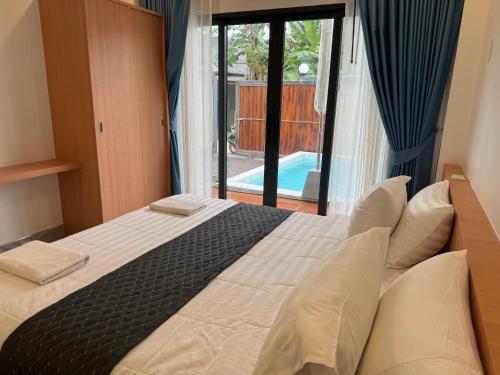 Giường trong phòng chung tại Luxury Boutique Pool Villa Ao Nang Krabi