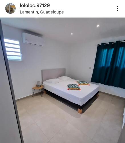 En eller flere senge i et værelse på Le berceau de la grande rivière