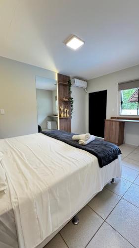 En eller flere senge i et værelse på Guest House Suite Renovo