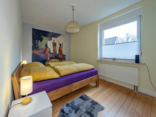En eller flere senge i et værelse på FeWo beim Schlafhaus