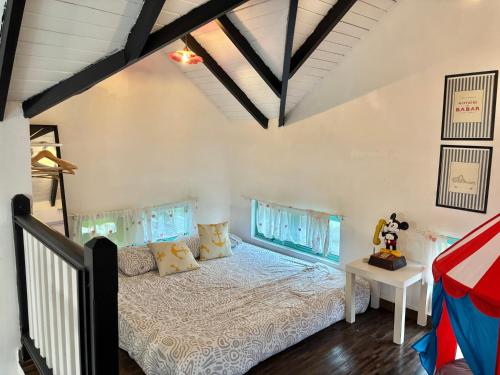 Postel nebo postele na pokoji v ubytování Sea Kecil Tiny House near Jetty of Kuala Besut