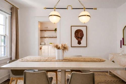 a dining room with a table and chairs at Golden Gazelle in Atlanta