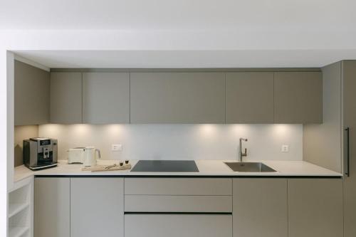 Køkken eller tekøkken på Millihaus Apartment by HomeFlow