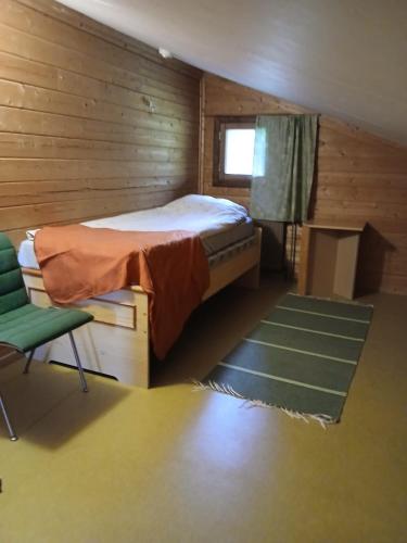 En eller flere senge i et værelse på Gasthause