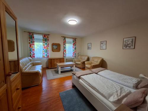 Postel nebo postele na pokoji v ubytování Sunny Garden Pihenőház