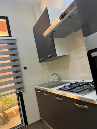 Køkken eller tekøkken på Residence Ndeye Ngouye