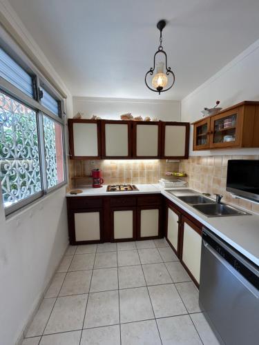 Køkken eller tekøkken på Bungalow Corossol