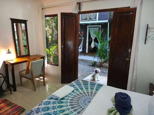 Postel nebo postele na pokoji v ubytování Guest House Pura Vida