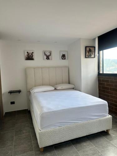 Postel nebo postele na pokoji v ubytování Sabaneta, Parque, Excelente ubicaciòn, Comodo, Buena vista