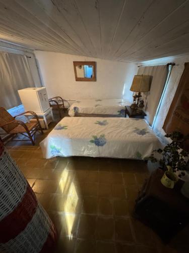 a bedroom with a large bed in a tent at Casa del monte in Carmen de Areco