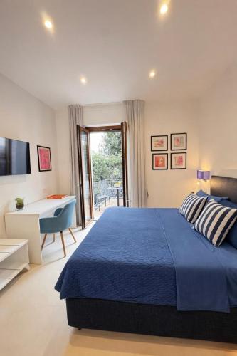 En eller flere senge i et værelse på Cozy Apartment with Lovely Terrace