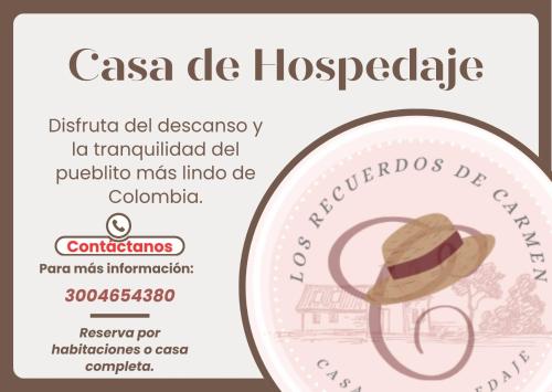 Et logo, certifikat, skilt eller en pris der bliver vist frem på Los recuerdos de Carmen