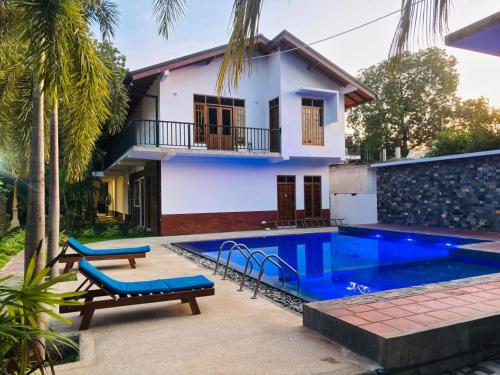 Swimmingpoolen hos eller tæt på So-J Beach Villa