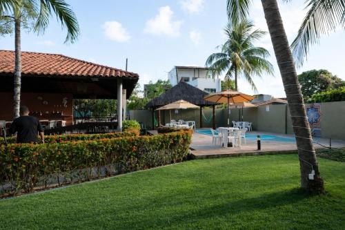 Swimmingpoolen hos eller tæt på Pousada Solar da Praia