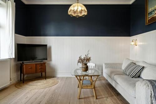 Et tv og/eller underholdning på Soul In A 100-Year-Old Villa On Langeland